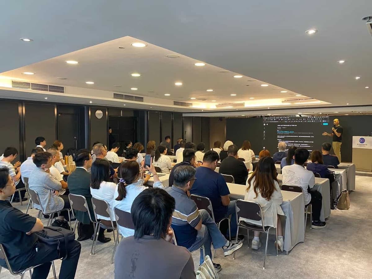 Ivan So presenting AI automation strategy at industry seminar